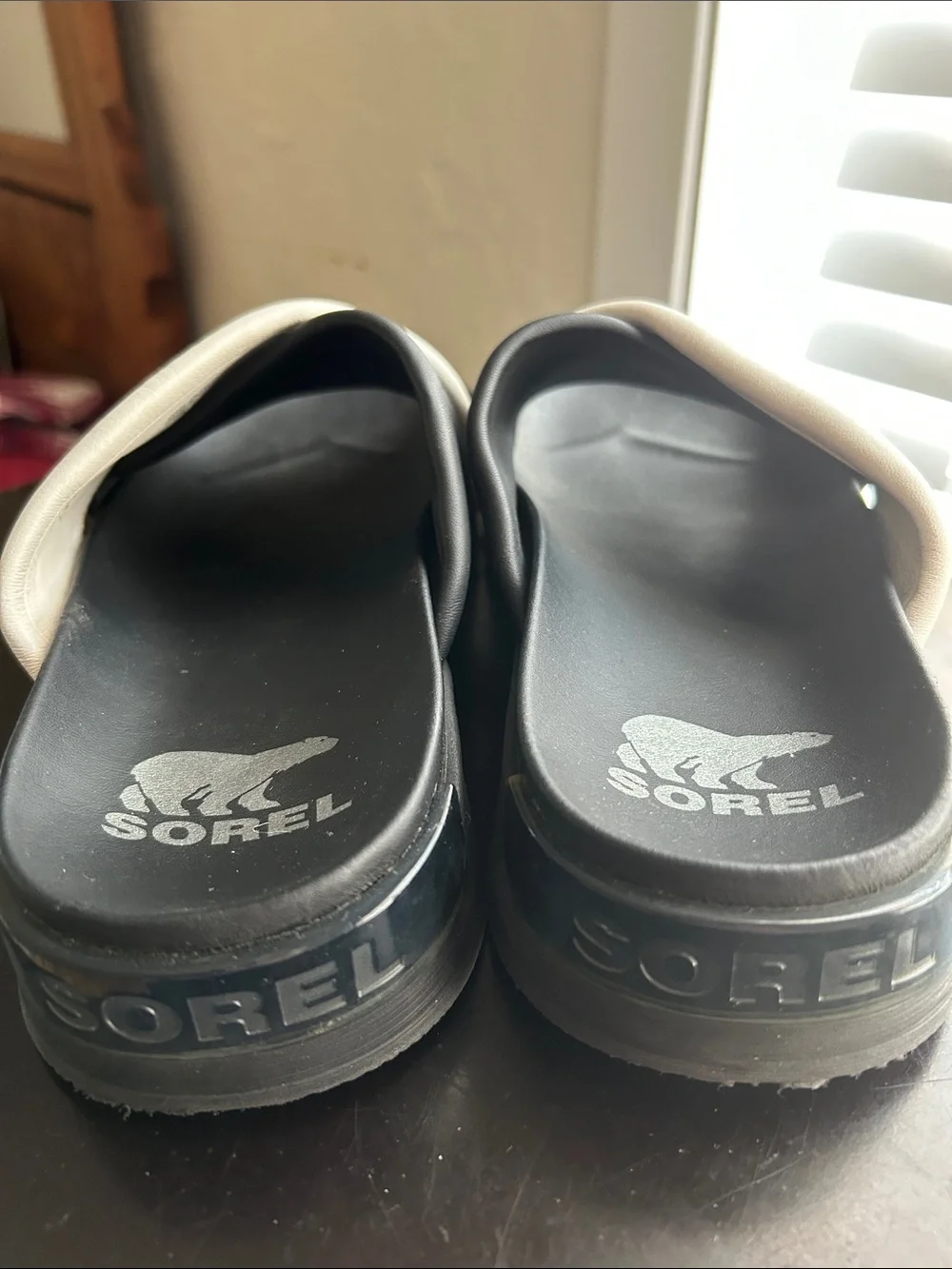 Sorel black and cream slides size 8